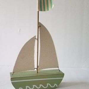 Adorable Sailboat accessory complete with sails